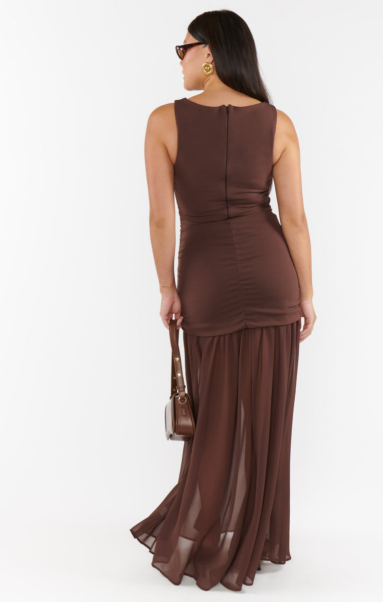 queens of archive aria chiffon maxi dress Meet Aria, The Scarlet Siren A dress that dances between vintage glamour and untamed allure. Drenched in fiery red and scattered with playful polka dots, this caped-sleeve maxi is a love