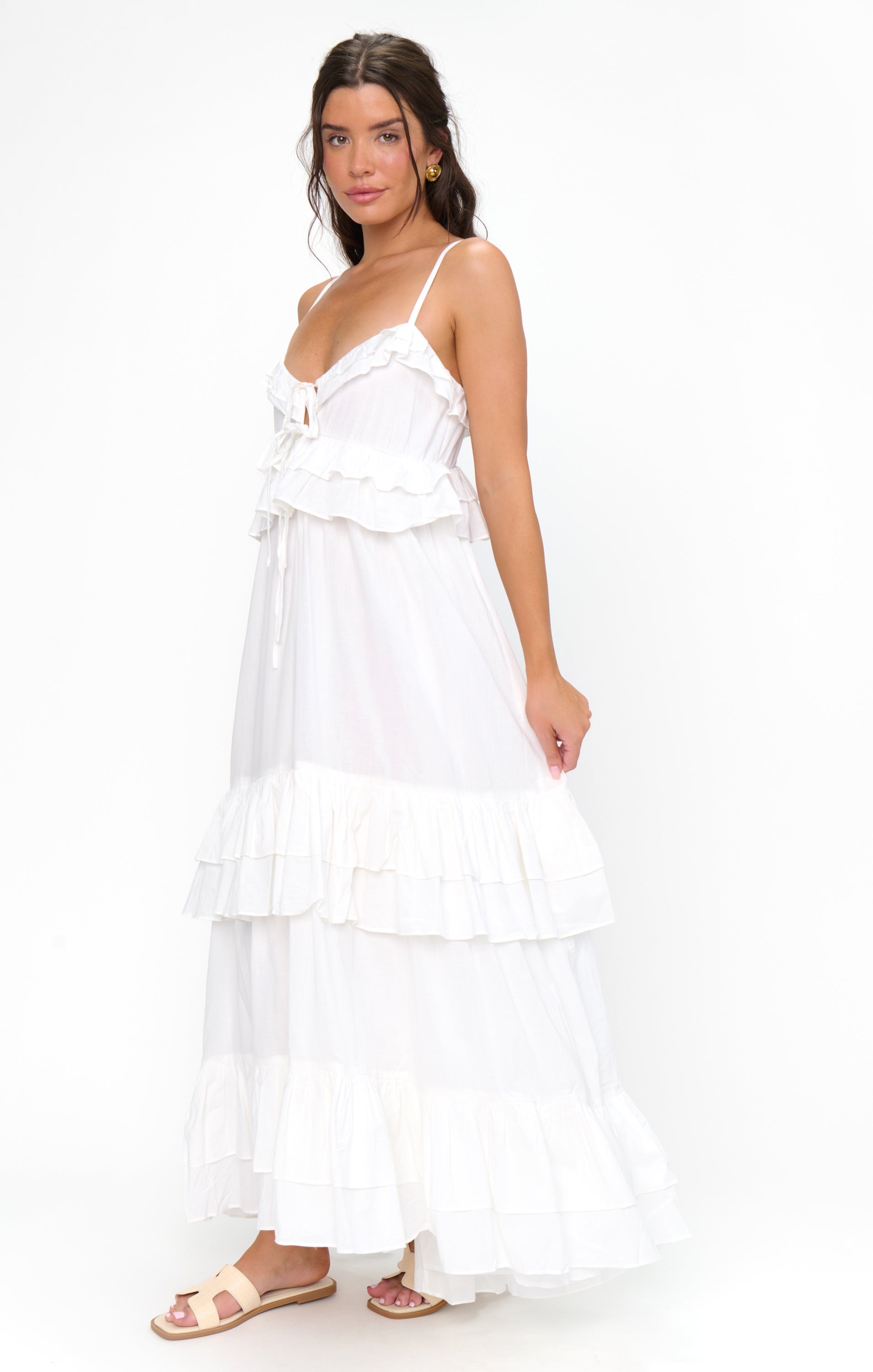 white maxi ruffle dress Catalina Tiered Featuring cascading white ruffles Chateau White Ruffle Maxi Dress